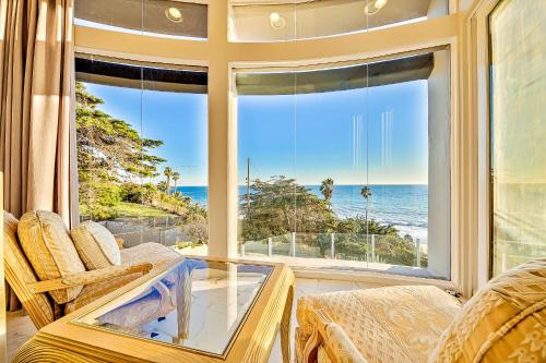 a living room with a view of the ocean at Luxury in Malibu in Malibu