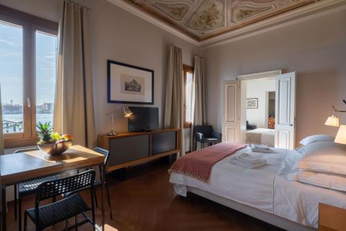 Cama ou camas em um quarto em Ve.N.I.Ce. Cera Tintoretto Suite