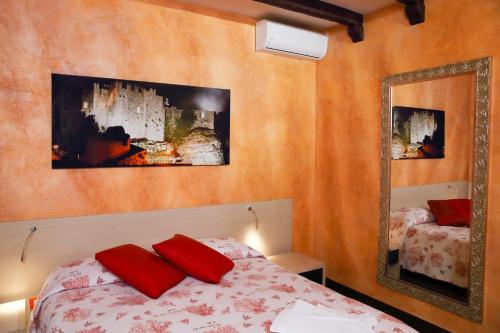 Giường trong phòng chung tại Case Vacanze Benvenuti al Sud