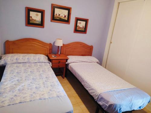 Cama ou camas em um quarto em Los Pinos