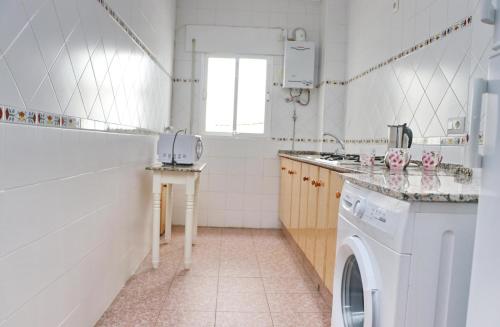 Kuchyň nebo kuchyňský kout v ubytování Apartamento Violeta