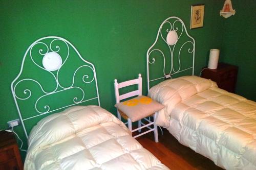 Postel nebo postele na pokoji v ubytování Agriturismo Campoletizia