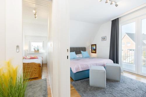Un ou plusieurs lits dans un hébergement de l'établissement Haus Waldfrieden Wohnung 1