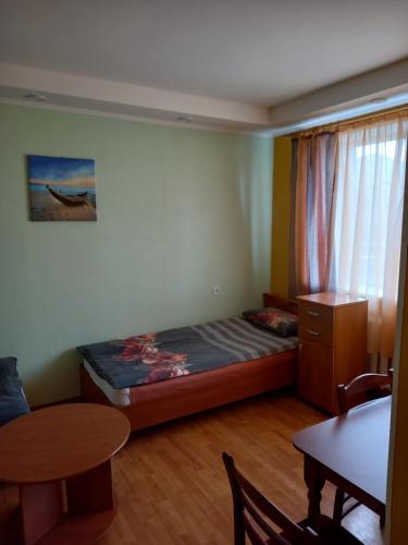 Postel nebo postele na pokoji v ubytování Family Apartment Rubini