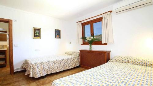 Postel nebo postele na pokoji v ubytování Villa Pantina