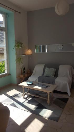 Posezení v ubytování Appartement dans maison de charme Doullens