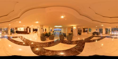 a large lobby with a sign in the middle at Anitas Hotel in Konaklı