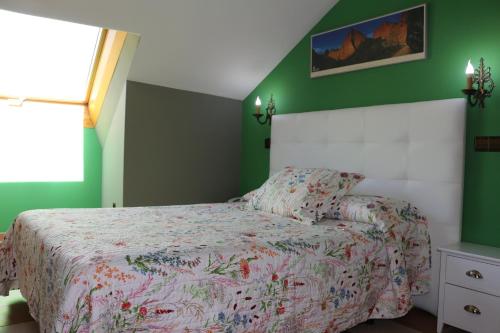 Postel nebo postele na pokoji v ubytování Hostal Don Jaime I y II