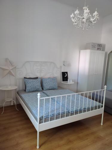 Ένα ή περισσότερα κρεβάτια σε δωμάτιο στο Apartman Dux