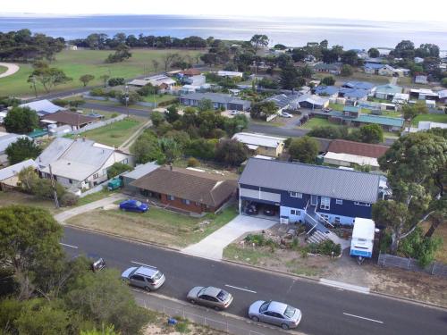 an aerial view of a small town with a road and cars at TryOver in Meningie