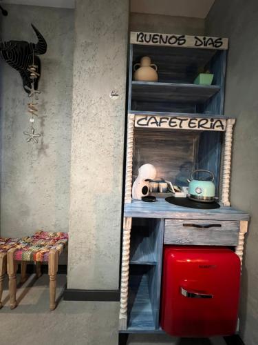 a kitchen with a counter and a red refrigerator at Global Home - Aparthotel - No Contact Check In in Mielec