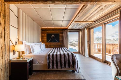 เตียงในห้องที่ Ultima Courchevel Belvédère