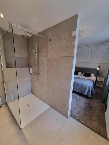 Cama ou camas em um quarto em De Kleine Vesting Arcen