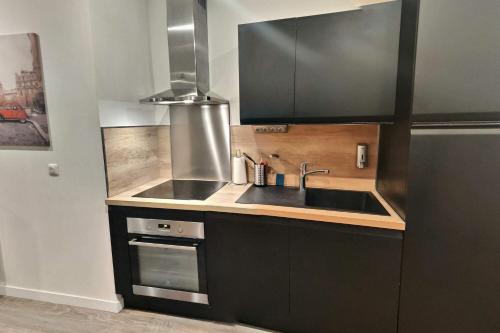 Kuchyň nebo kuchyňský kout v ubytování Superbe, T3 spacieux 78 m2, Neuf, Parking, Balcon