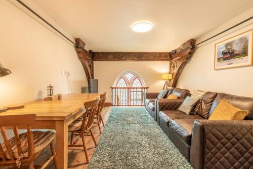 a living room with a couch and a table at Host & Stay - The Nave in Gorleston-on-Sea