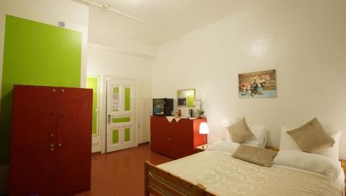 A bed or beds in a room at Westend City Hostel