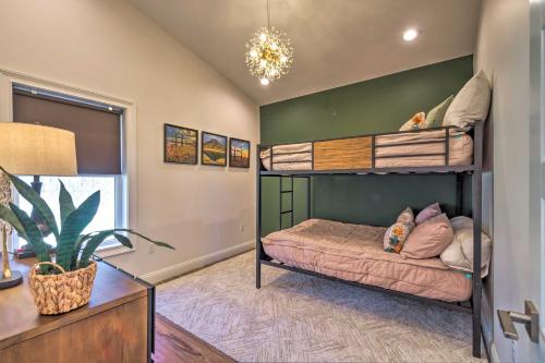 a bedroom with two bunk beds in a room at Upscale and Quiet Paducah Retreat on 15 Acres! in Paducah