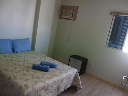 Llit o llits en una habitació de Braga Apartamento Temporada Maceió