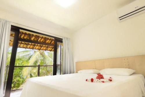 Katil atau katil-katil dalam bilik di Sun Bay Pipa Hotéis