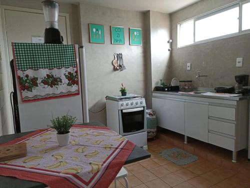 مطبخ أو مطبخ صغير في Braga Apartamento Temporada Maceió
