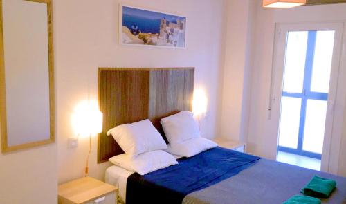 Postel nebo postele na pokoji v ubytování AREA PLAYA VIVEIRO APARTAMENTS , XOVE