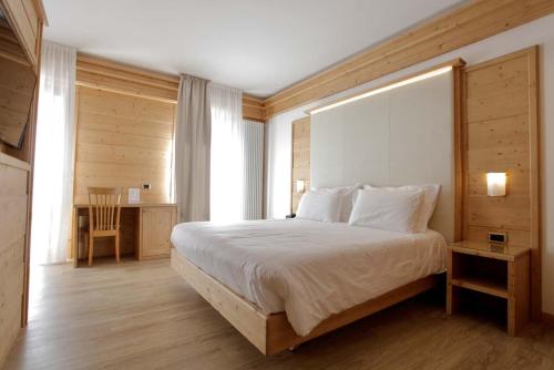 Ένα ή περισσότερα κρεβάτια σε δωμάτιο στο Hotel Cima Rosetta - BW Signature Collection