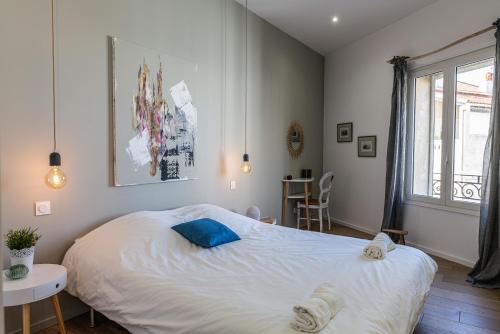Giường trong phòng chung tại Bord de mer, magnifique appartement de 150m2 avec jardin