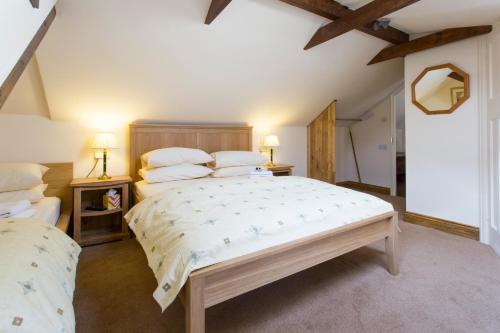 Ένα ή περισσότερα κρεβάτια σε δωμάτιο στο Oakwood Bed and Breakfast Heathrow