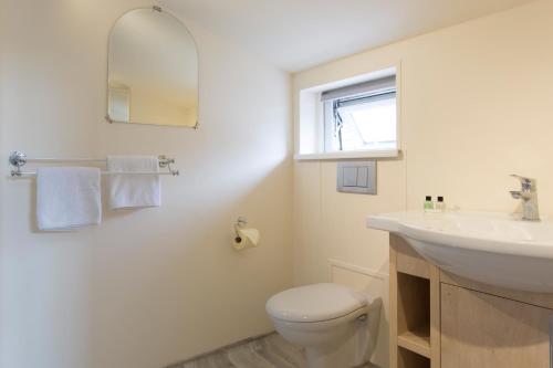 Vonios kambarys apgyvendinimo įstaigoje Oakwood Bed and Breakfast Heathrow
