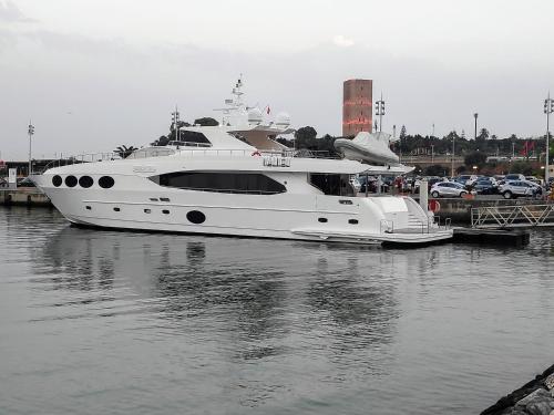 a large white boat docked in the water at La Marina Luxury Apartment Fully Furnished Free WiFi, High Standard Residence, Amazing Prime Location Close to Restaurants, Transport, Beach and Bouregreg River in Sale