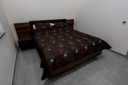 Postel nebo postele na pokoji v ubytování Apartament Grabowski Stone Design