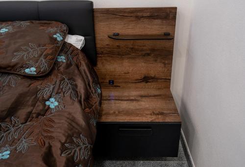 Postel nebo postele na pokoji v ubytování Apartament Grabowski Stone Design