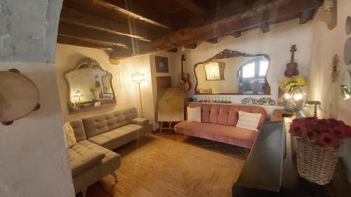 A seating area at THE BLUE HOUSE OF COSTA BRAVA Leni's attic