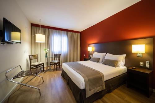 Кровать или кровати в номере Hotel Panamby São Paulo