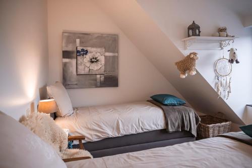 Кровать или кровати в номере B&B De Klaproos