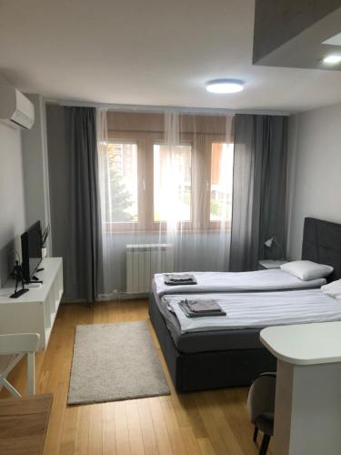 Postel nebo postele na pokoji v ubytování A Blok A7