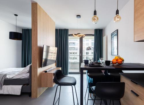 Posteľ alebo postele v izbe v ubytovaní Portowa Przystań by Comfort Apartments
