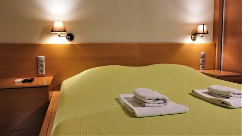 Posteľ alebo postele v izbe v ubytovaní Villiana Holiday Apartments