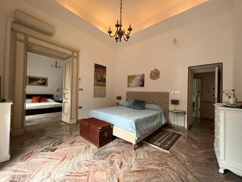 Ein Bett oder Betten in einem Zimmer der Unterkunft Residenze Pessina