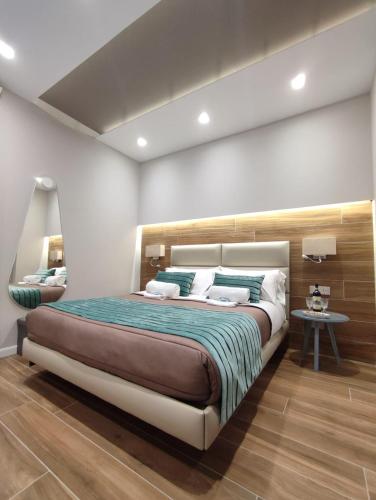Postel nebo postele na pokoji v ubytování il sogno di afrodite luxury b and b