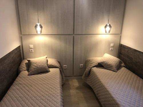 Ein Bett oder Betten in einem Zimmer der Unterkunft Salou Apartamento Premium a 150m Playa Zona Capellans Visita Port Aventura