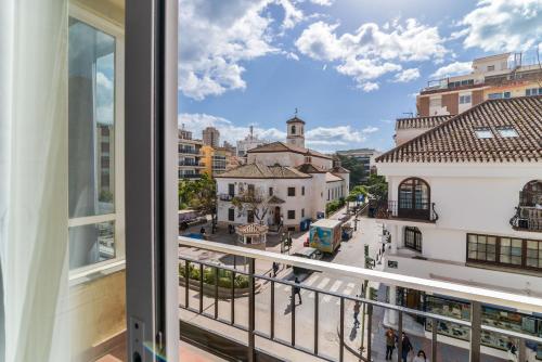 a view from a balcony of a city street at LXR Bellavista 3Hab. Next to Sea in Fuengirola