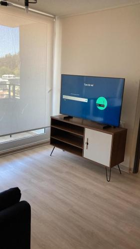 TV a/nebo společenská místnost v ubytování Piso 13 Concepcion