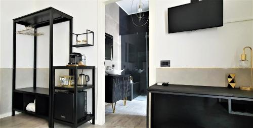 Kuchyň nebo kuchyňský kout v ubytování Welcome Verona Rooms