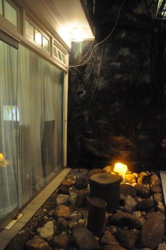 a room with a fire pit in the middle at Fort de 19 Villa - Galle Fort in Galle