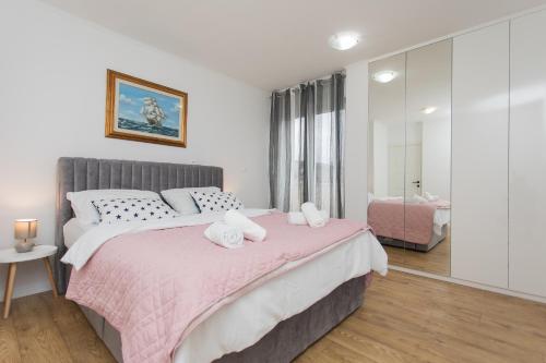 Postel nebo postele na pokoji v ubytování Luxury Apartment Jana