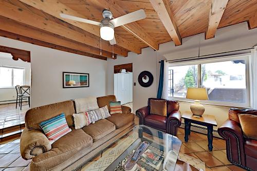 a living room with a couch and chairs at Kathryn Place Casita in Santa Fe