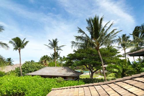 a view of a resort with palm trees at Mauna Lani 2002 in Waikoloa