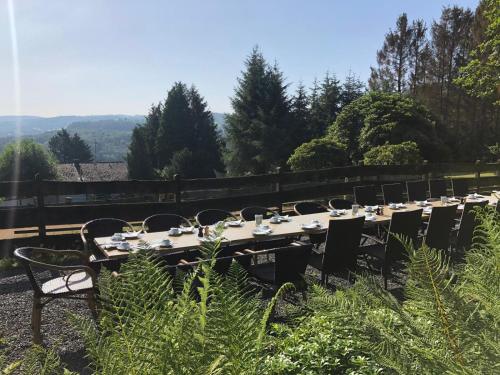 a table set up for a meal in a garden at Bergische Schweiz in Engelskirchen