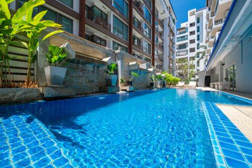 Bazén v ubytování Kokotel Pattaya South Beach nebo v jeho okolí